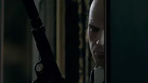 Hitman Hd Peeking With Gun Wallpaper