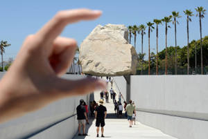 Holding Big Rock Wallpaper
