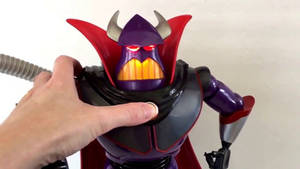 Holding Emperor Zurg Figurine Wallpaper