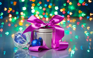 Holiday Purple Ribbon Gift Wallpaper