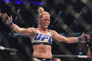 Holly Holm Wins Ufc Bantamweight Championship Wallpaper