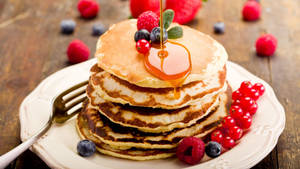 Honey Syrup On Pancakes Wallpaper