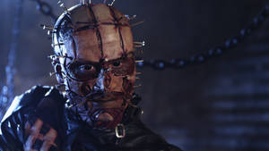 Horrifying Icon: Pinhead From Hellraiser Revelation Wallpaper