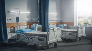 Hospital Bed With Window Light Wallpaper