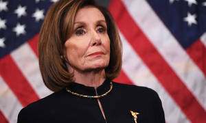 House Speaker Nancy Pelosi In A Formal Black Dress Standing Amidst Us Flags Wallpaper