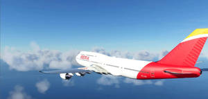 Iberia Airlines Flying Airplane With Red Tail Wallpaper