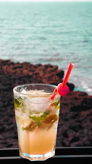 Ice Cube On Glass With Straw Wallpaper