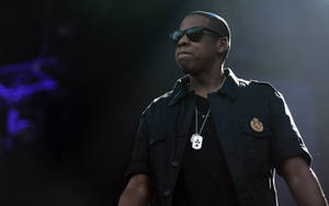 Iconic 90s Rapper Jay-z Stylishly Posing With Sunglasses Wallpaper