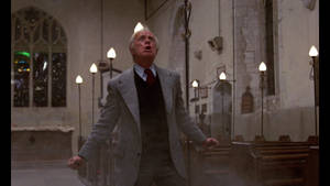 Iconic Hollywood Star Richard Widmark In 'to The Devil A Daughter' Wallpaper