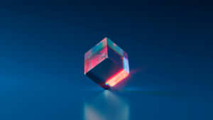 Illuminated Crystal Cubeon Blue Background Wallpaper