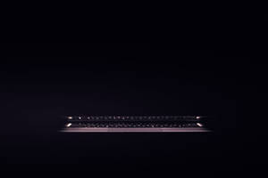 Illuminated Dark Laptop Keyboard Wallpaper