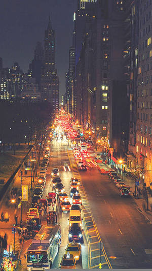 Illuminated Night Streets Of New York City Captured Through An Iphone X Wallpaper