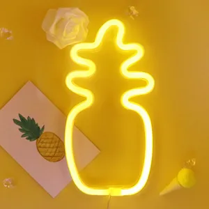 Illuminating The City With Yellow Neon Lights Wallpaper