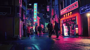 Image A Stunning Cityscape Of Neon Signs In Tokyo, Japan. Wallpaper