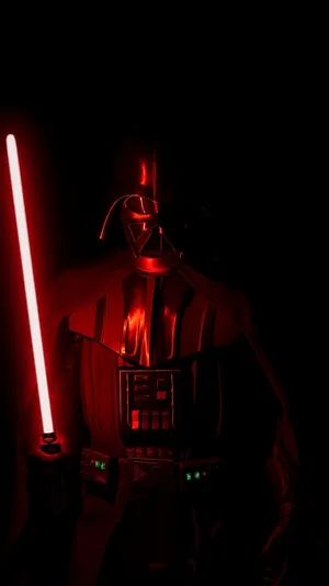 Immerse Yourself In The Dark Side With A Stylish Darth Vader Iphone Wallpaper