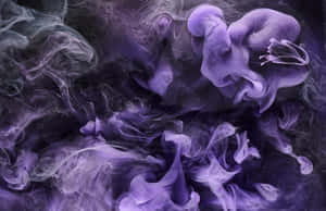 Immersed In A Lush Blue Atmosphere Of Smoke Wallpaper