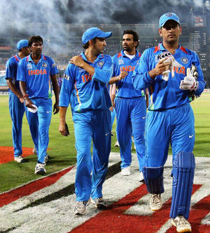 Indian Cricket Team Walking Into The Stadium Wallpaper