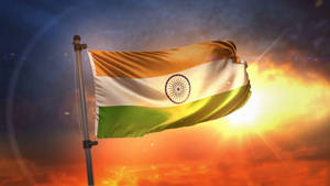 Indian Flag Under The Blazing Skies Wallpaper