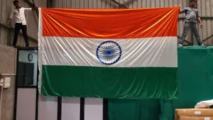 Indian Flag With Two Men Holding Wallpaper