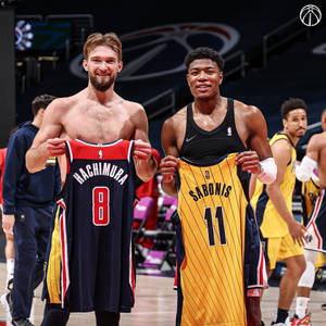 Indiana Pacers Star Domantas Sabonis Exchanging Jerseys Post-game Wallpaper