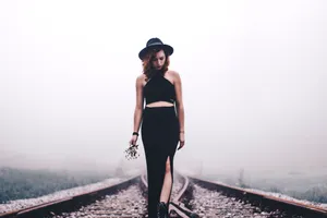 Indie Woman In Train Railway Wallpaper