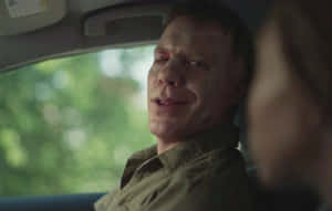 Injured Manin Car Scene Wallpaper