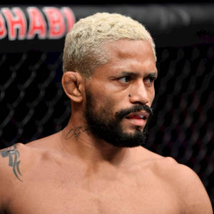 Intense Close-up Of Ufc Champion Deiveson Figueiredo Wallpaper