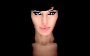 Intense-looking Angelina Jolie Wallpaper