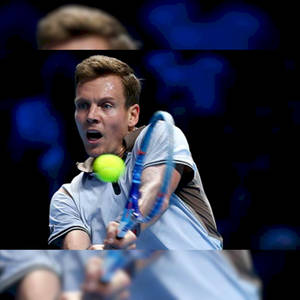 Intense Moment Of Tomas Berdych Playing Tennis Wallpaper