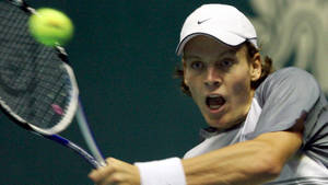 Intense Moment: Tennis Star Tomas Berdych In Action Wallpaper