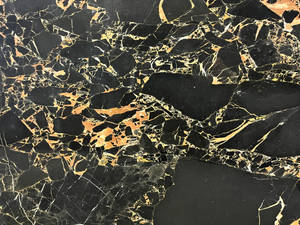 Intriguing Patterns Of Black And Gold Marble Wallpaper