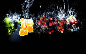 Invigorate Your Health - A Collection Of Various Fresh Fruits Wallpaper