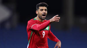 Iran National Football Team Player Mehdi Giving Signal Wallpaper