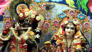 Iskcon Statue Of Lord Krishna And Radha Rani Wallpaper