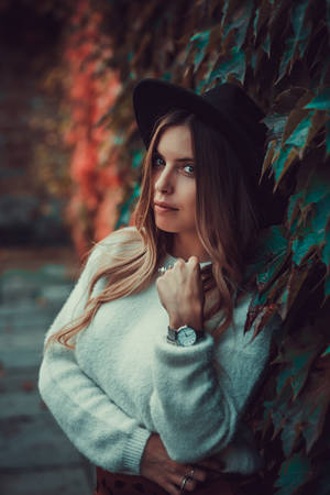 Italian Girl With Wall Of Leaves Wallpaper