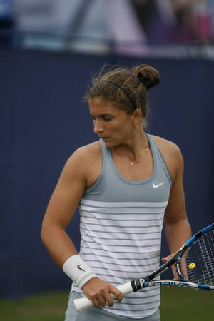 Italian Tennis Pro Sara Errani In Action Wallpaper