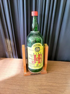 J&b Rare Giant Whisky Bottle Wallpaper