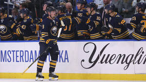 Jack Eichel Buffalo Sabres High Fiving Teammates Wallpaper