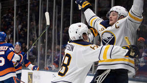 Jack Eichel Hugged Celebration Wallpaper