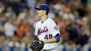 Jacob Degrom Wearing A Baseball Glove Wallpaper