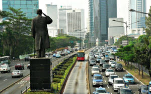 Jakarta's Pulse - Jalan Jenderal Sudirman In Full Swing Wallpaper