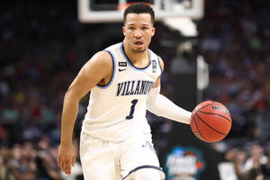 Jalen Brunson Playing Basketball Wallpaper