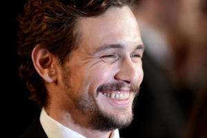 James Franco Spotlight Smiling Wallpaper