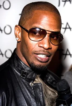 Jamie Foxx In Black Leather Wallpaper