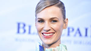 January Jones Exuding Glamour In Stylish Hairstyle Wallpaper