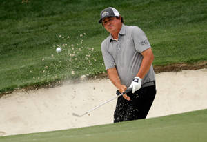 Jason Dufner Hitting A Golf Ball Wallpaper