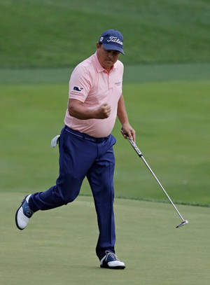 Jason Dufner Popping His Leg Up Wallpaper