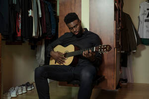 Jaylen Brown Playing Acoustic Guitar Wallpaper