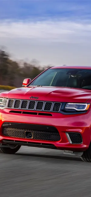 Jeep Trackhawk Under Clear Sky Wallpaper