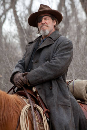 Jeff Bridges In His Outstanding Performance In The Film True Grit. Wallpaper